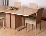 Bespoke Dining table and chairs in oak